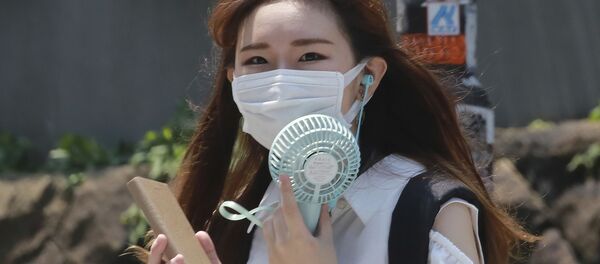 マスクをしている女性 マスクをしている女性 - Sputnik 日本