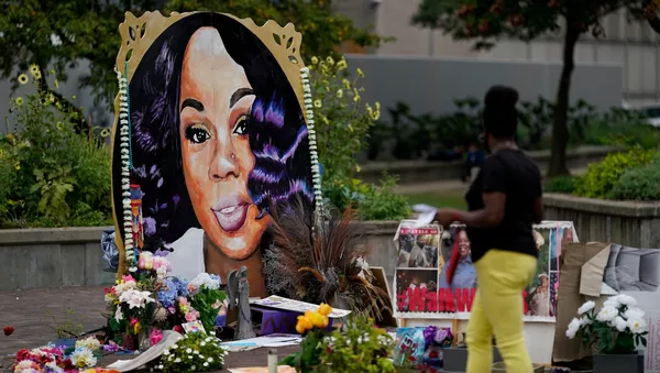 A woman visits the memorial for Breonna Taylor in Louisville, Kentucky, U.S., September 11, 2020.  