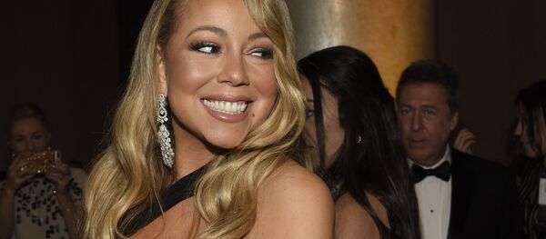 Певица Мэрайя Кэри на 75-й ежегодной церемонии вручения премий Золотой глобус Певица Мэрайя Кэри на 75-й ежегодной церемонии вручения премий Золотой глобус - Sputnik 日本