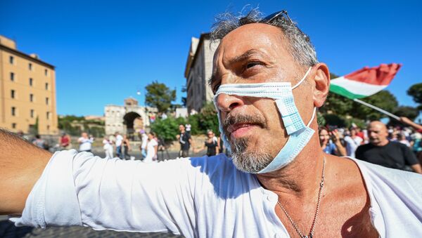 マスク着用要請に抗議する男性 - Sputnik 日本
