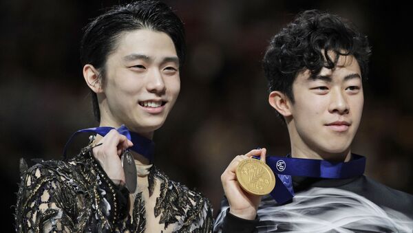 Japan's Yuzuru Hanyu and Nathan Chen from the U.S. display their silver and gold medals respectively during the men's free skating routine during the ISU World Figure Skating Championships at Saitama Super Arena in Saitama, north of Tokyo, Saturday, March 23, 2019.  - Sputnik 日本