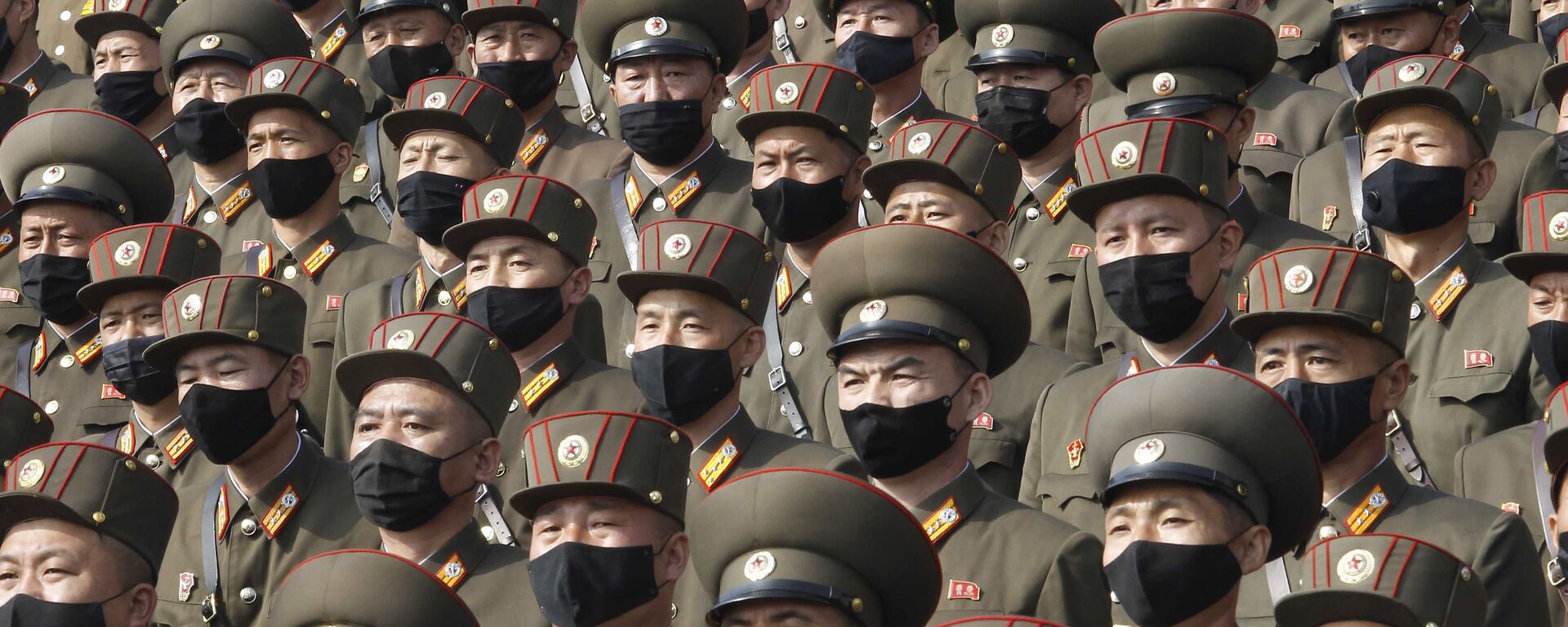 Многотысячный митинг в масках на площади Ким Ир Сена в Пхеньяне, посвященный началу 80-дневной кампании в поддержку предстоящего 8-го съезда Рабочей партии Кореи, который состоится в январе 2021 года, КНДР - Sputnik 日本, 1920, 30.03.2021