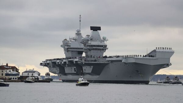The new British aircraft carrier HMS Prince of Wales arrives at Portsmouth Naval Base after its first sea trials, in Portsmouth, southern England, Saturday Nov. 16, 2019 - Sputnik 日本