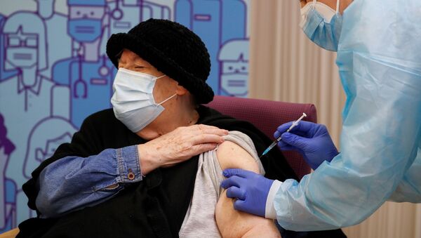 ワクチンを接種するスペインの女性 - Sputnik 日本