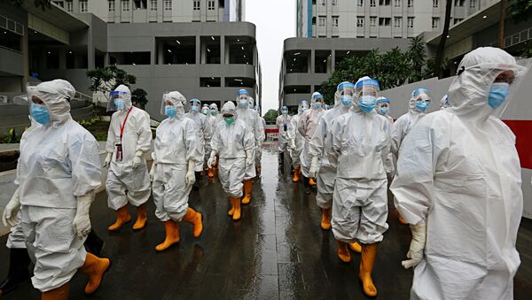 Медицинские работники в средствах индивидуальной защиты в Джакарте, Индонезия - Sputnik 日本
