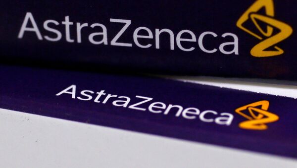 FILE PHOTO:The logo of AstraZeneca is seen on medication packages in a pharmacy in London. - Sputnik 日本