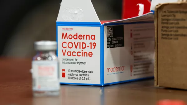 Упаковка с вакциной Moderna COVID-19 - Sputnik 日本