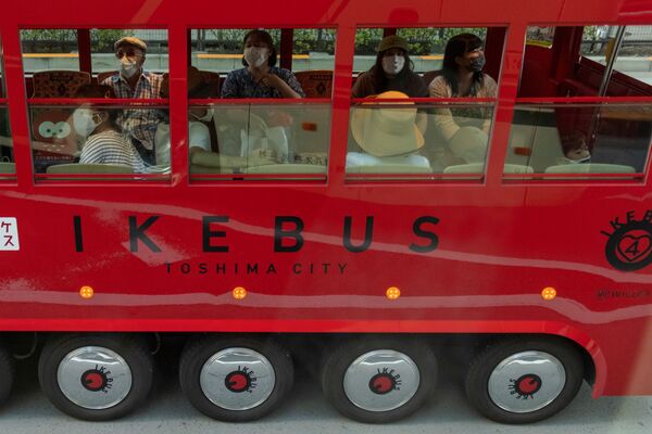 東京の観光バスに乗る人々  - Sputnik 日本