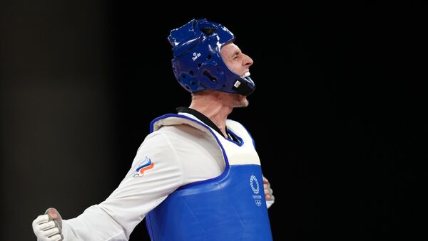 Владислав Ларин, завоевавший золотую медаль в соревнованиях по тхэквондо на XXXII летних Олимпийских играх в Токио - Sputnik 日本