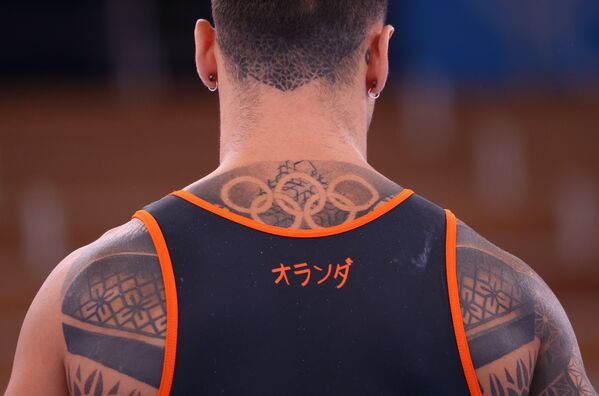 背中にオリンピックシンボルのタトゥーを入れたオランダの選手 - Sputnik 日本