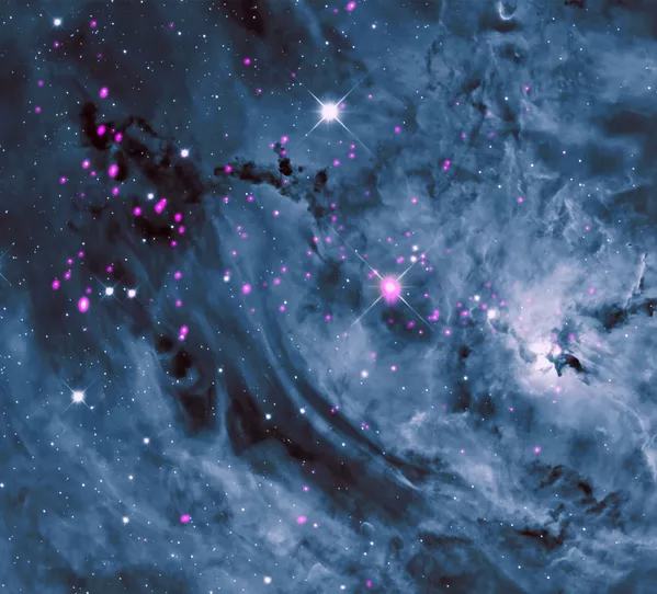 NASAのチャンドラX線望遠鏡が観測した「干潟星雲 (Lagoon Nebula)」。地球から約4077光年の距離に位置する NASAのチャンドラX線望遠鏡が観測した「干潟星雲 (Lagoon Nebula)」。地球から約4077光年の距離に位置する - Sputnik 日本