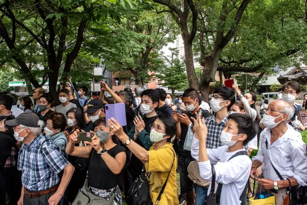 増上寺周辺で安倍元首相の出棺を見送る弔問客(東京都・港区、12日) 増上寺周辺で安倍元首相の出棺を見送る弔問客(東京都・港区、12日) - Sputnik 日本
