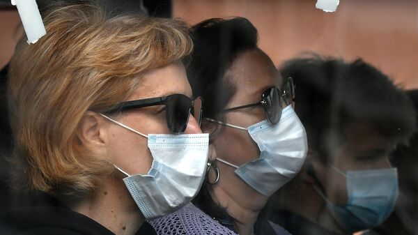 マスクをつける女性 - Sputnik 日本