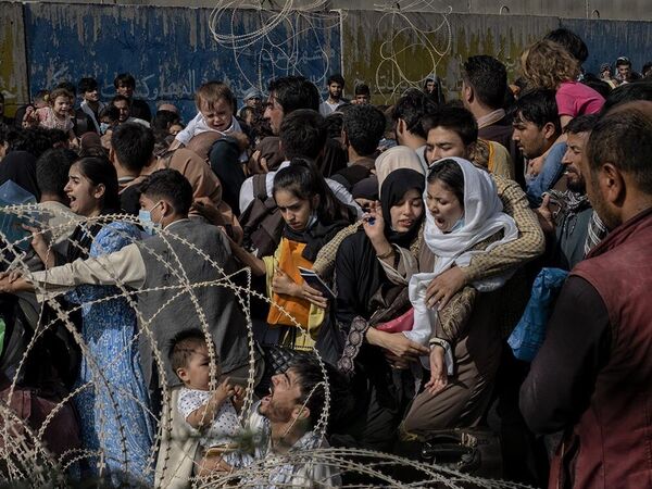 プロフェッショナル部門「Editorial / Press Photographer Of the Year」受賞作品『Abrazos Desde Kabul』　Juan Carlos氏（エルサルバドル） - Sputnik 日本