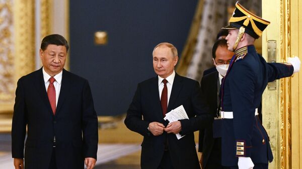 モスクワでの露中会談を前にしたロシアのプーチン大統領と中国の習近平国家主席 - Sputnik 日本