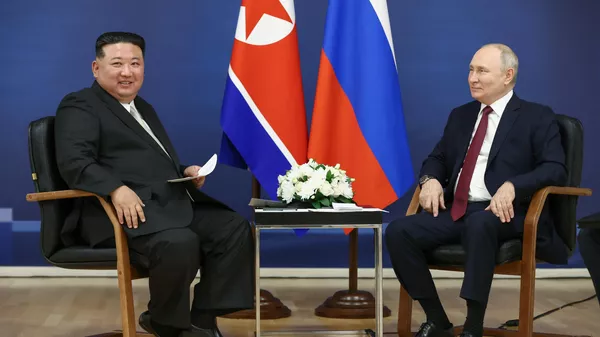 金正恩総書記とプーチン大統領 - Sputnik 日本