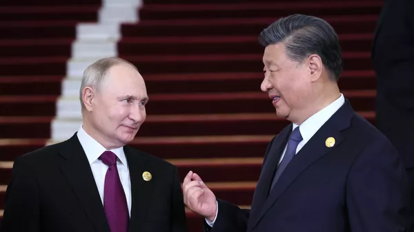 習近平主席と言葉を交わすプーチン大統領 - Sputnik 日本