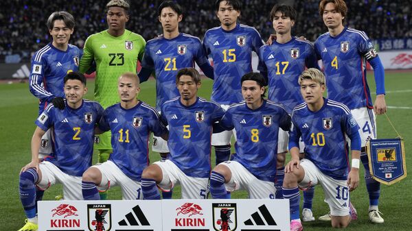Японская команда по футболу перед матчем с командой Северной Кореи - Sputnik 日本
