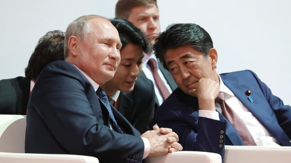 プーチン大統領と安倍晋三元首相 - Sputnik 日本