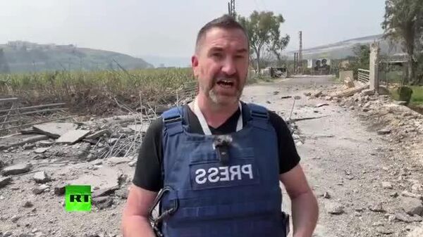 【数メートル先に着弾 取材中の記者、イスラエル攻撃で負傷】 - Sputnik 日本