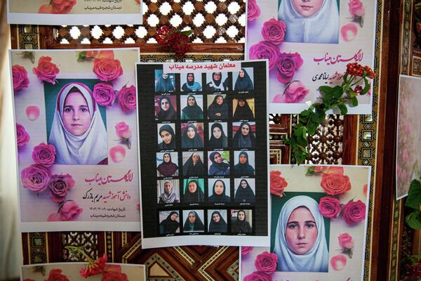 Portraits of school children from the Shajarah Tayyebeh Elementary School in Minab, who were killed in a U.S strike are displayed during a press conference by Iranian Ambassador to Tunisia Massoud Hosseinian, in Tunis, Tunisia, Thursday, March 12, 2026. (AP Photo/Ons Abid) - Sputnik 日本