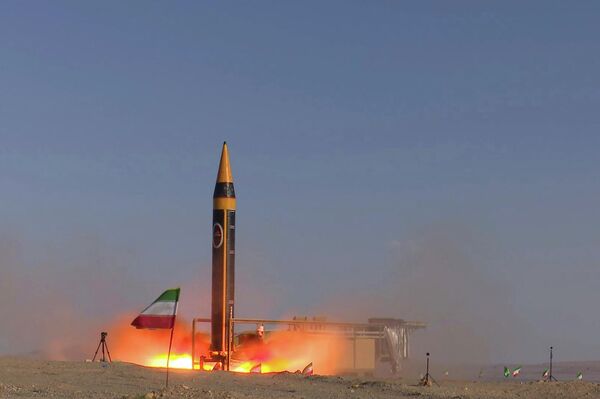 In this photo released by the Iranian Defense Ministry on May 25, 2023, Khorramshahr-4 missile is launched at an undisclosed location, Iran (Iranian Defense Ministry via AP) - Sputnik 日本