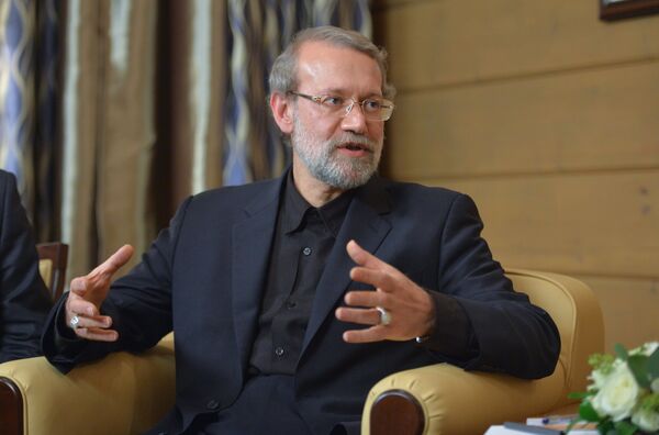 Speaker of the Islamic Consultative Council (parliament) of the Islamic Republic of Iran Ali Larijani during a meeting with Russian President Vladimir Putin following the 12th annual meeting of the Valdai International Discussion Club. File photo - Sputnik 日本