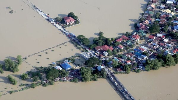 フィリピン、洪水で7万人以上が避難 - Sputnik 日本