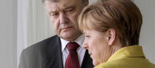 ポロシェンコ大統領とメルケル首相(アーカイブ写真) ポロシェンコ大統領とメルケル首相(アーカイブ写真) - Sputnik 日本