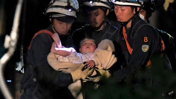 日本、震災後6時間後がれきから幼児救出 - Sputnik 日本