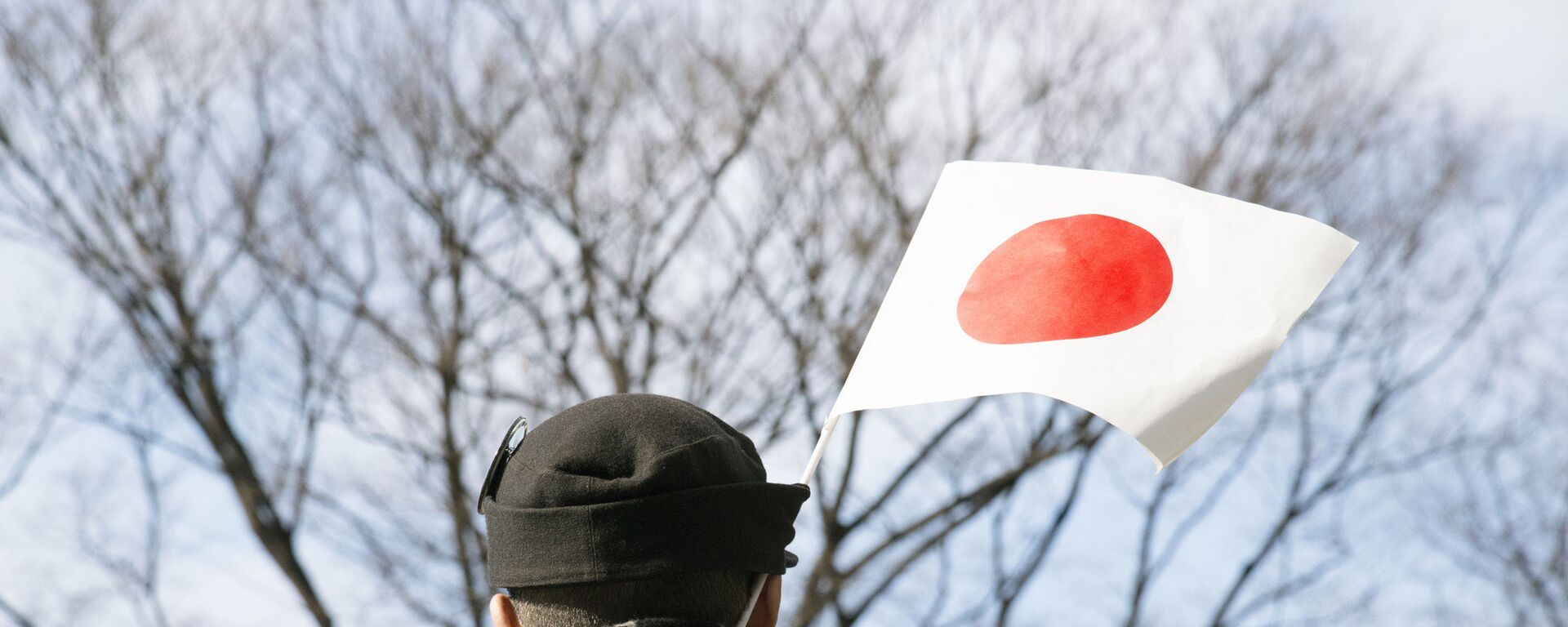 日本国旗を持つ男性 - Sputnik 日本, 1920, 11.06.2022