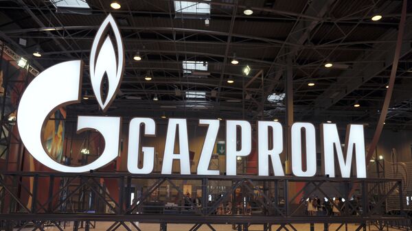 Logo Gazpromu - Sputnik 日本