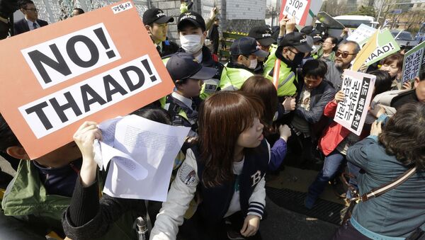 Протестующие напротив Министерства обороны в Сеуле на митинге против установки системы ПРО THAAD в Южной Корее - Sputnik 日本
