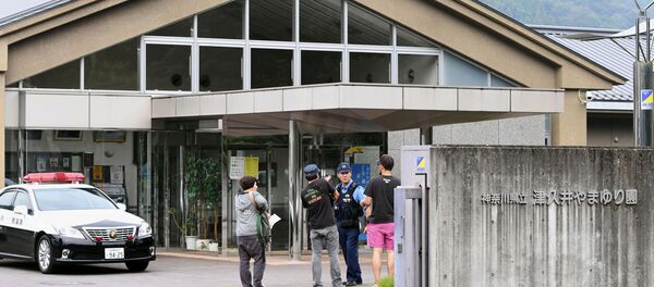 Полицейский на месте резни в доме инвалидов в Японии - Sputnik 日本