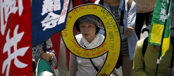 東京のメーデー、日本の軍国化反対のスローガンが叫ばれる 東京のメーデー、日本の軍国化反対のスローガンが叫ばれる - Sputnik 日本