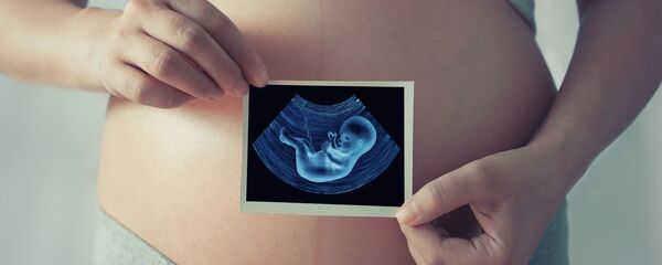 Беременная девушка со снимком УЗИ Беременная девушка со снимком УЗИ - Sputnik 日本