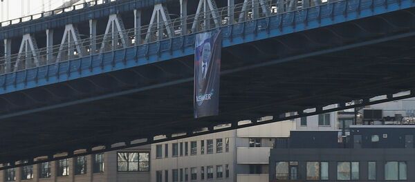 ニューヨークに「ピースメーカー」のキャプション付きプーチン大統領の巨大肖像画が登場 ニューヨークに「ピースメーカー」のキャプション付きプーチン大統領の巨大肖像画が登場 - Sputnik 日本