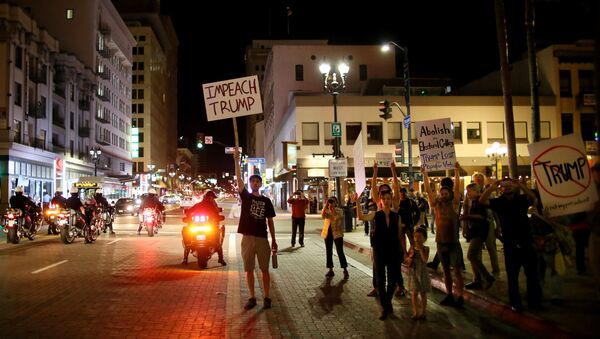 Demonstrators walk through Downtown San Diego in protest to the election of Republican Donald Trump as the president of the United States in San Diego, California, U.S. November 9, 2016 - Sputnik 日本