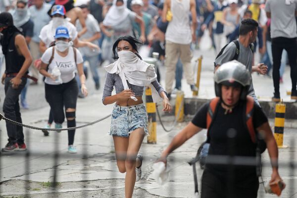 ベネズエラのカラカスで行われたベネズエラ大統領ニコラス・マドゥロに反対するデモ - Sputnik 日本