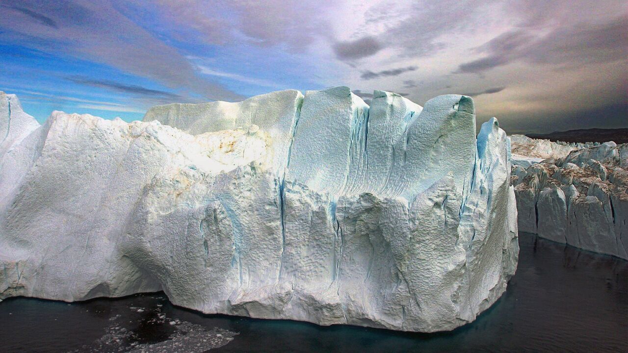 氷床と万年雪などで有名な世界最大の島グリーンランド 99年前のシロクマさんの硬貨 急激に進むグリーンランド氷河融解 毎日60億トンが海洋へ - 2022