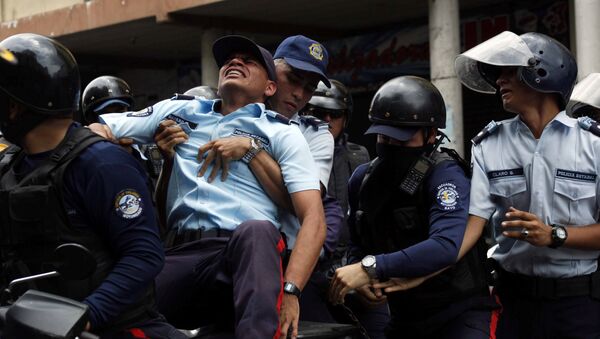 ベネズエラ　抗議デモ中に国家警備隊員が殺害される - Sputnik 日本