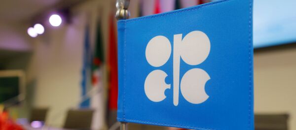 A flag with the Organization of the Petroleum Exporting Countries (OPEC) logo is seen before a news conference at OPEC's headquarters in Vienna, Austria, December 10, 2016 A flag with the Organization of the Petroleum Exporting Countries (OPEC) logo is seen before a news conference at OPEC's headquarters in Vienna, Austria, December 10, 2016 - Sputnik 日本