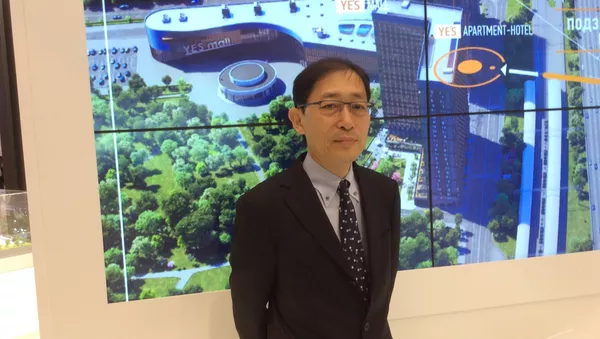 ロシアのテレビ局の取材を受ける亀井社長 - Sputnik 日本
