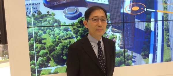 ロシアのテレビ局の取材を受ける亀井社長 ロシアのテレビ局の取材を受ける亀井社長 - Sputnik 日本