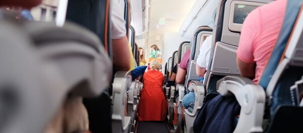 Пассажиры и бортпроводница в самолете авиакомпании Аэрофлот во время полета Пассажиры и бортпроводница в самолете авиакомпании Аэрофлот во время полета - Sputnik 日本