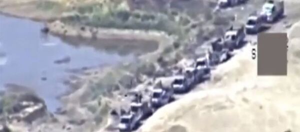 シリア「ダーイシュ（IS)」の車列　アブ・カマルを出てイラクとの国境へ向かう - Sputnik 日本