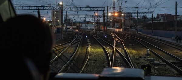 Машинист в кабине первого пассажирского поезда в объезд Украины - Sputnik 日本