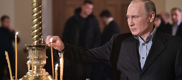 Президент РФ Владимир Путин во время Рождественского богослужения в церкви святых и праведных Симеона Богоприимца и Анны Пророчицы в Санкт-Петербурге Президент РФ Владимир Путин во время Рождественского богослужения в церкви святых и праведных Симеона Богоприимца и Анны Пророчицы в Санкт-Петербурге - Sputnik 日本