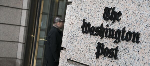 A man walks into the Washington Post's new building March 3, 2016 in Washington, DC A man walks into the Washington Post's new building March 3, 2016 in Washington, DC - Sputnik 日本