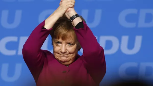 独大統領、メルケル氏の首相就任を承認